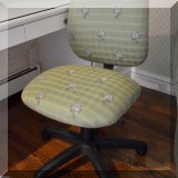 F19. Upholstered adjustable desk chair. 